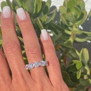 Moissanite 5 stone 1.5 ctw band 4.75